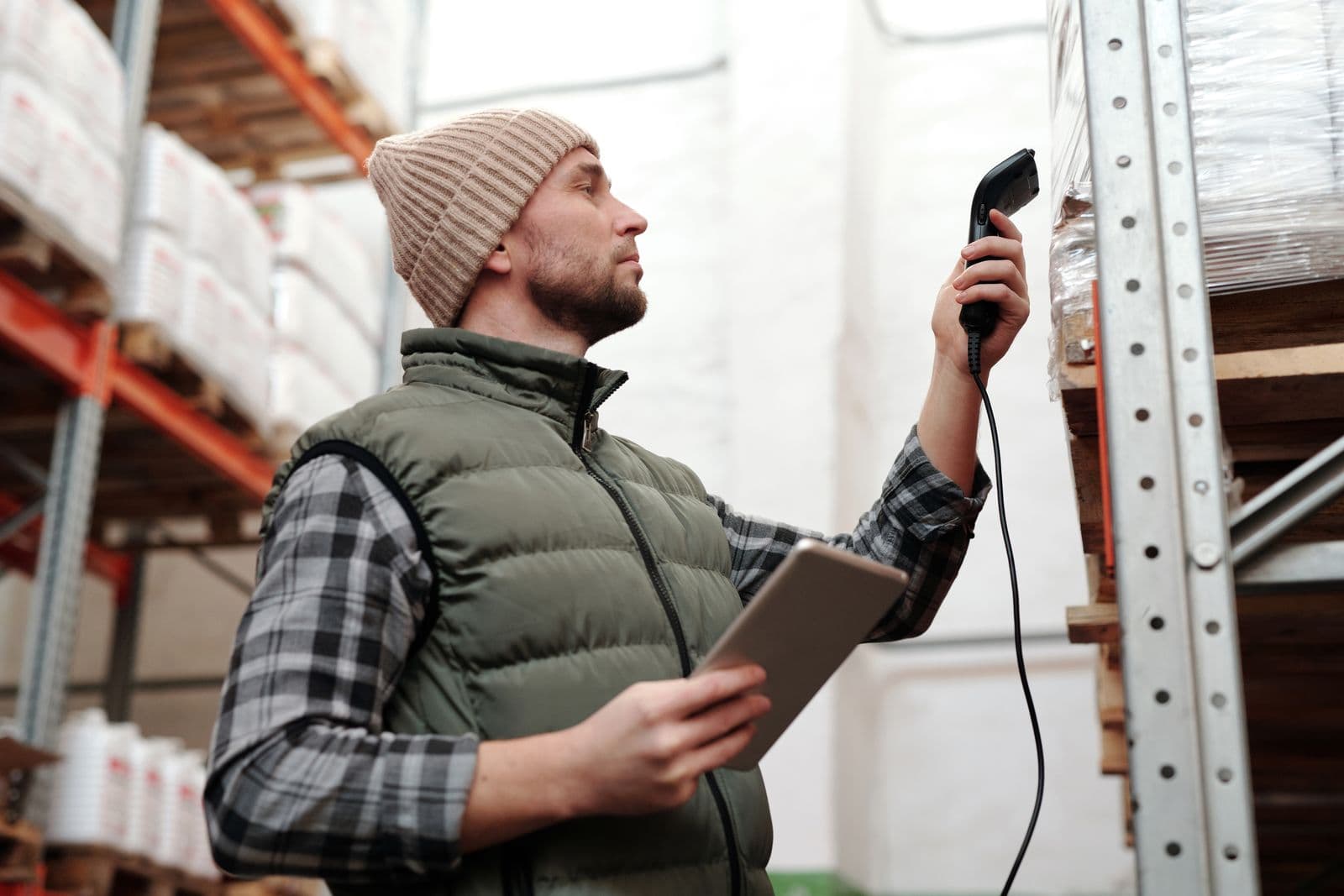 Warehouse worker scanning products